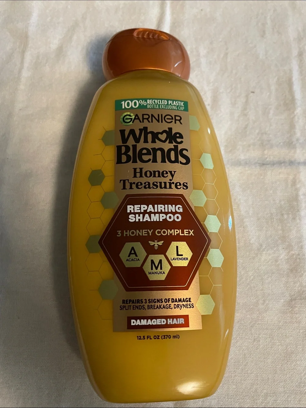 Garnier Whole Blends Honey Treasures Shampoo - Yellow with Gold Accents